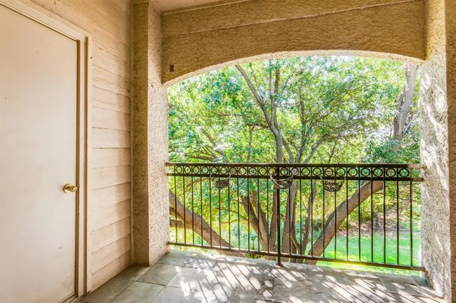 a view of a room with a large window