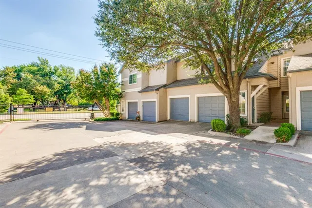 a view of a house with a street