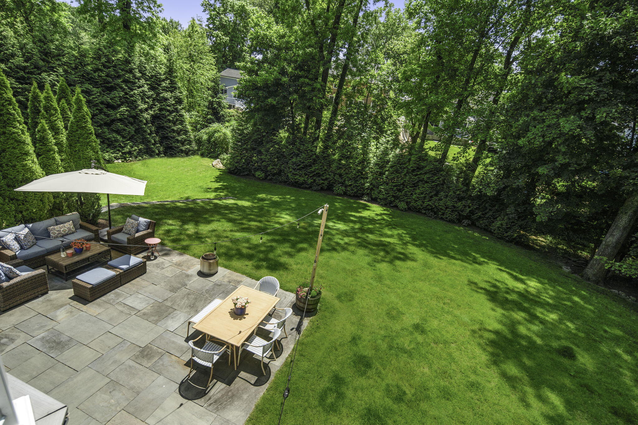 19 Indian Spring Road Norwalk, CT 06853 - Photo 25 of 25 Backyard stone patio