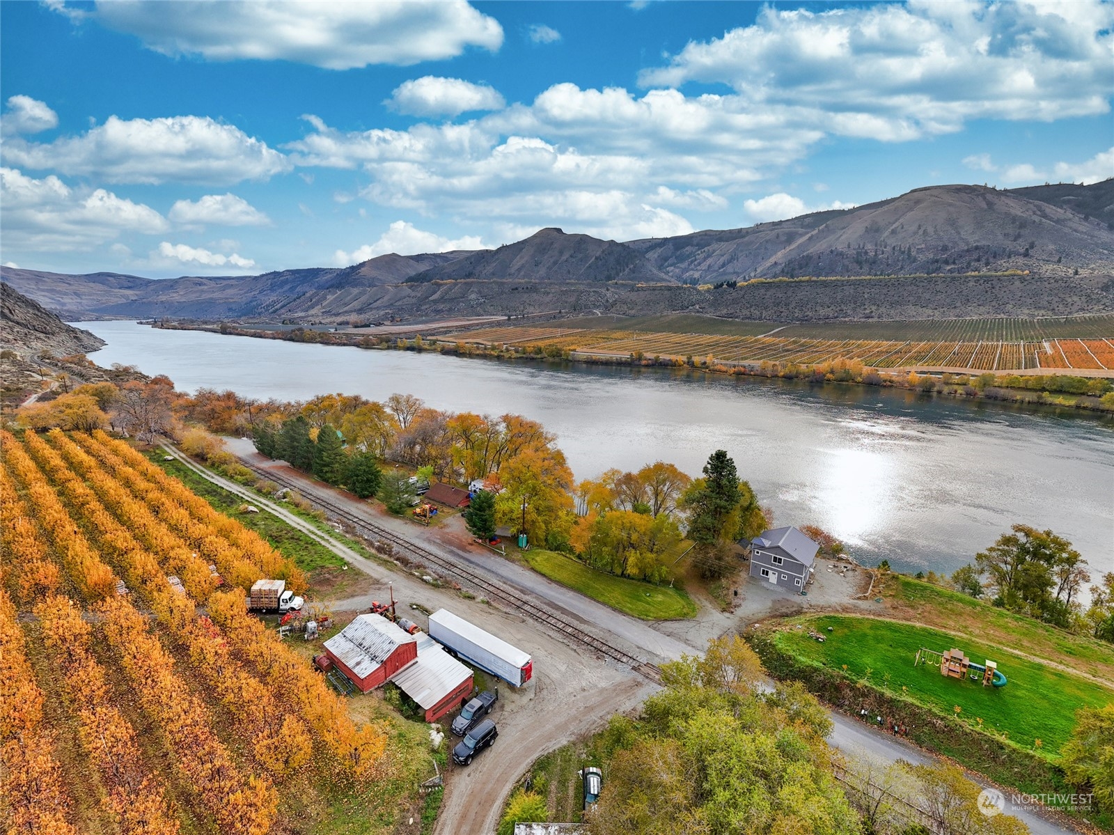 3710 Stayman Flats Road Chelan, WA 98816 - Photo 2 of 40 a view of a lake with a mountain