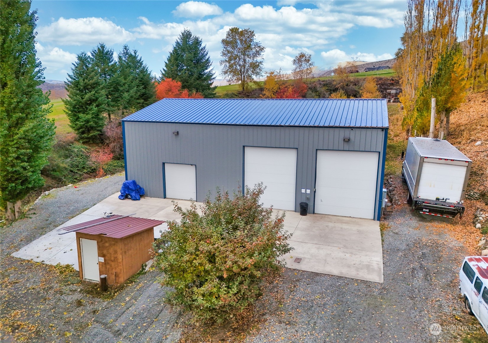 3710 Stayman Flats Road Chelan, WA 98816 - Photo 6 of 40 a view of a house with a yard