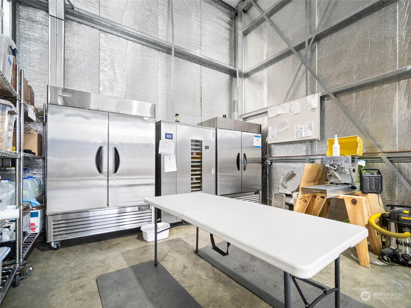 3710 Stayman Flats Road Chelan, WA 98816 - Photo 9 of 40 a room with lots of white furniture and a window