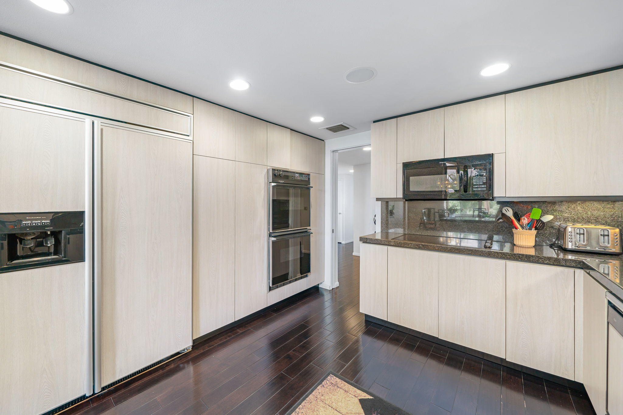 900 Island Drive, Unit 314 Rancho Mirage, CA 92270 - Photo 17 of 46 a kitchen with stainless steel appliances a refrigerator and microwave