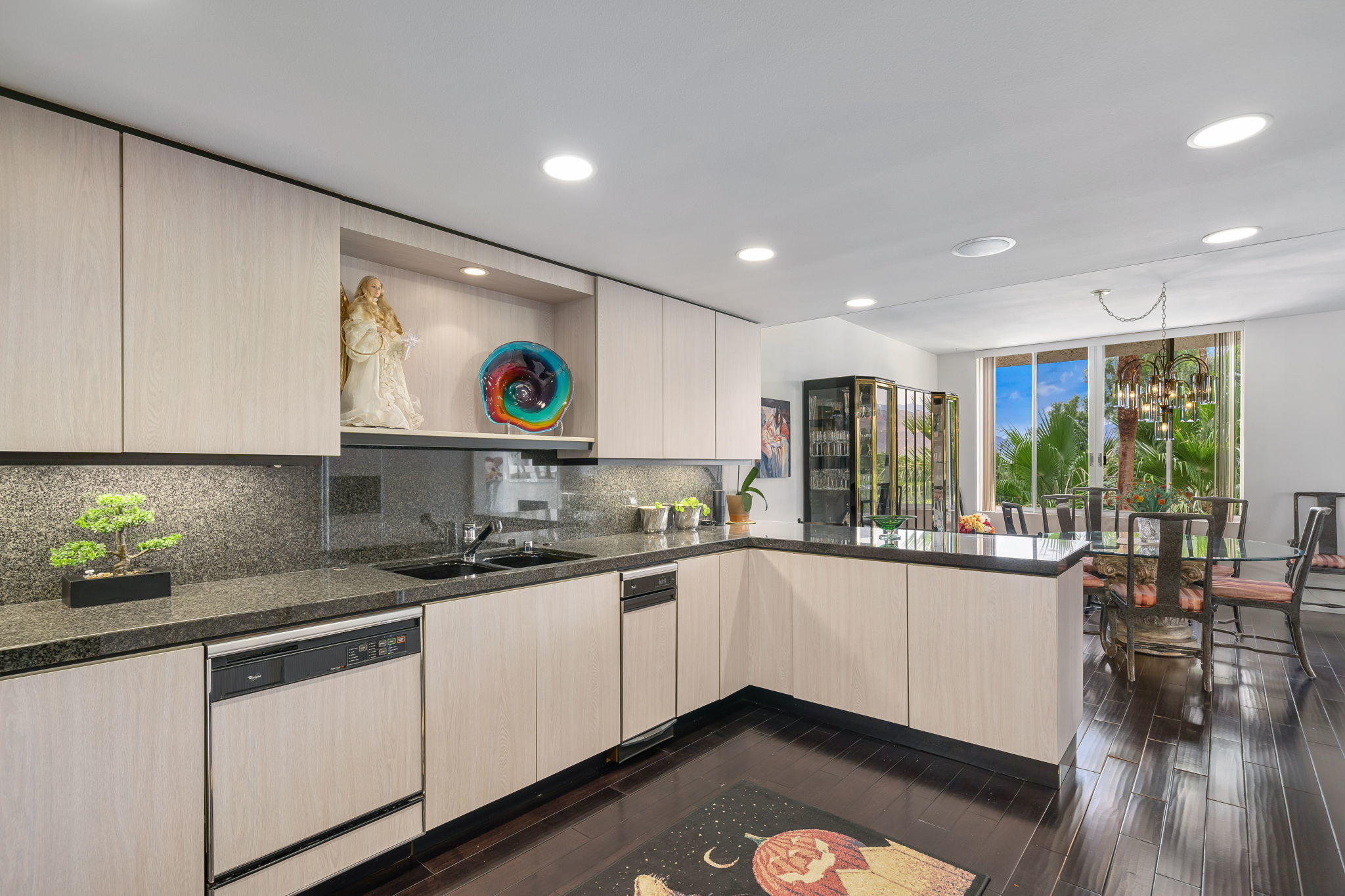 900 Island Drive, Unit 314 Rancho Mirage, CA 92270 - Photo 18 of 46 a kitchen with a sink and cabinets