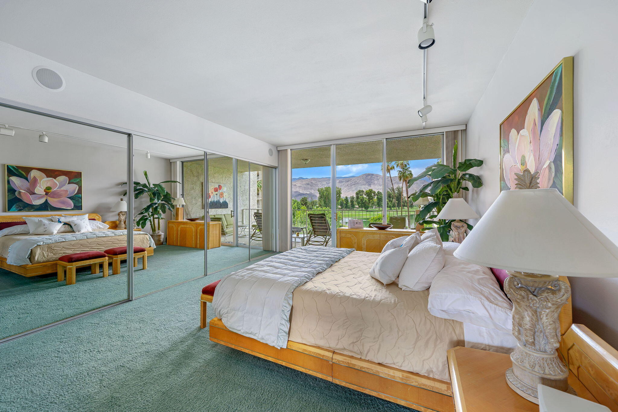 900 Island Drive, Unit 314 Rancho Mirage, CA 92270 - Photo 29 of 46 a bedroom with a bed and a large window