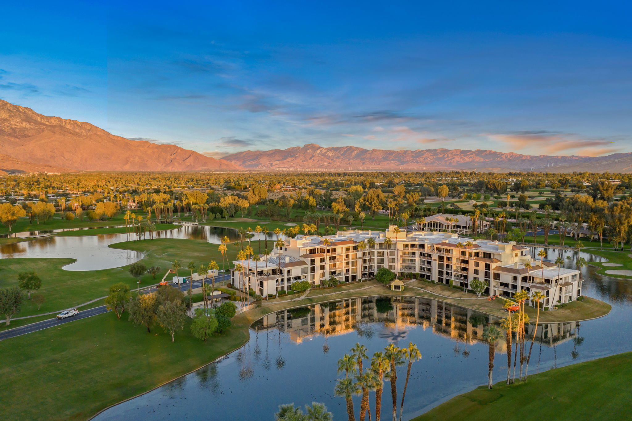 900 Island Drive, Unit 314 Rancho Mirage, CA 92270 - Photo 44 of 46 a view of a city with lawn chairs