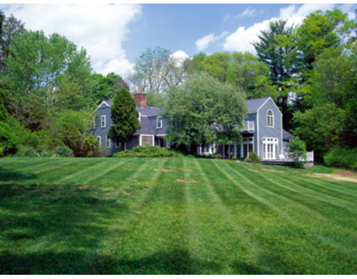 42 Ripley Lane Weston, MA 02493 - Photo 5 of 7 a front view of a house with garden