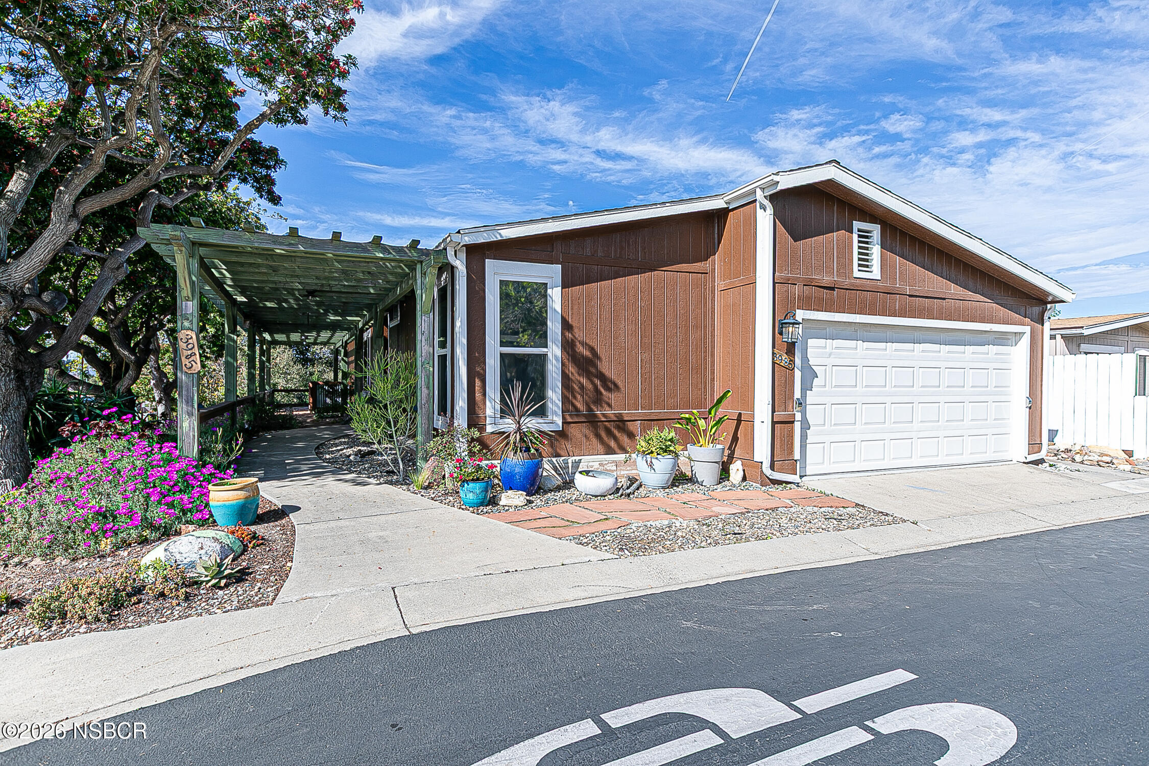 3985 Chatham Way Santa Maria, CA 93455 - Photo 2 of 22 a backyard of a house with seating space