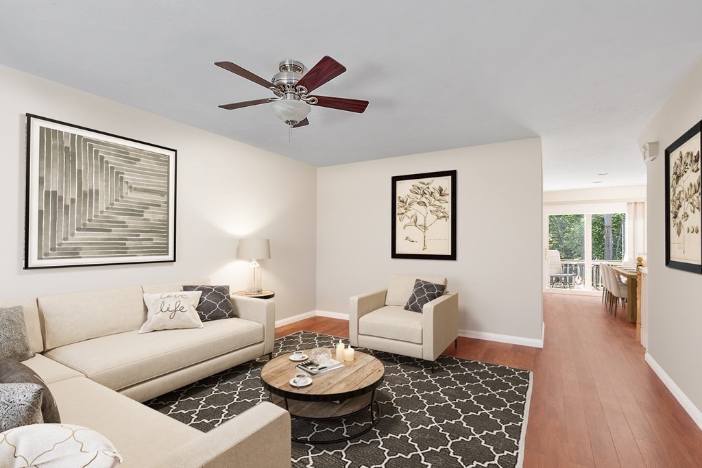 35 Fredonian Street, Unit K Shirley, MA 01464 - Photo 4 of 12 a living room with furniture and wooden floor