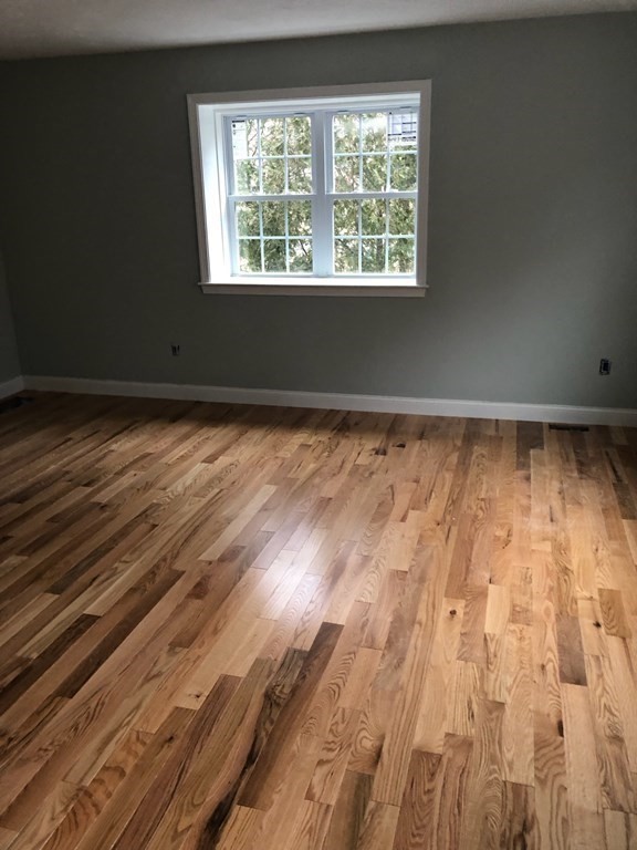 35 Fredonian Street, Unit K Shirley, MA 01464 - Photo 6 of 12 a view of a room with wooden floor and window