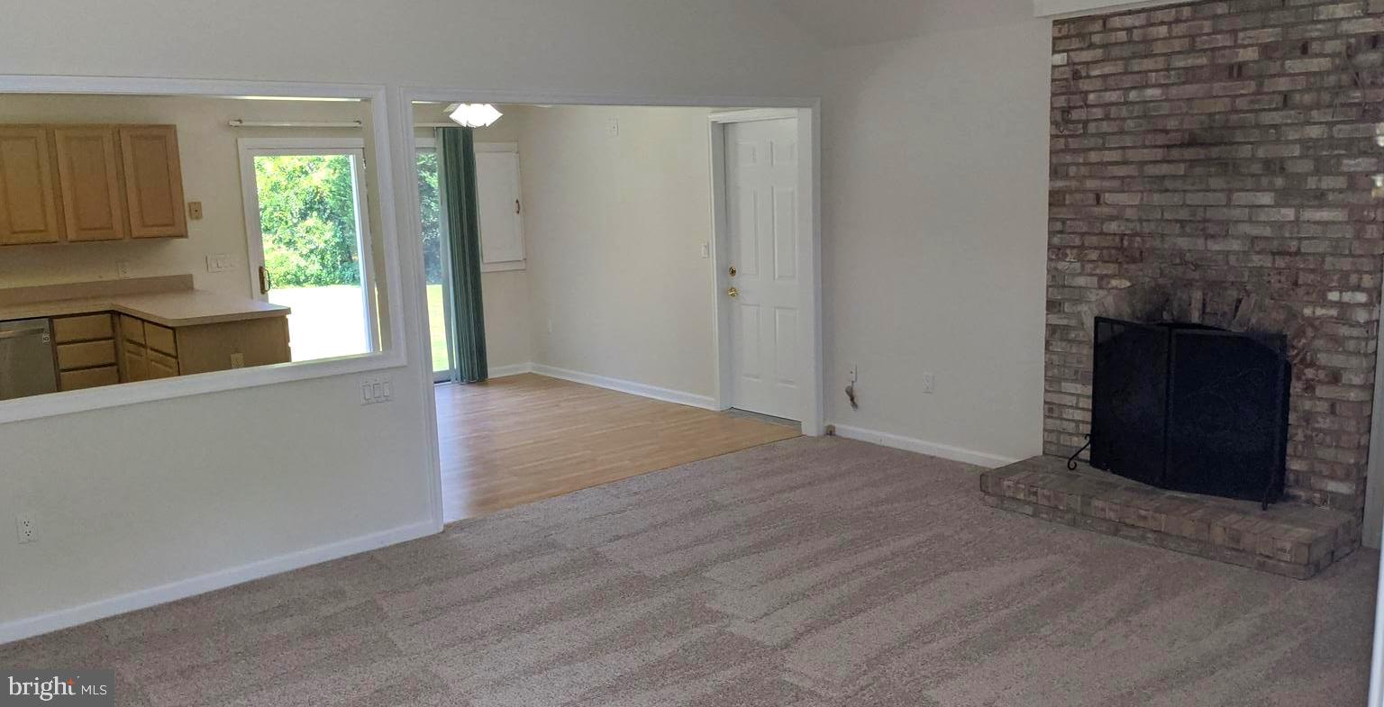 130 Taylor Road Centreville, MD 21617 - Photo 2 of 39 LIVING ROOM- WOOD BURNING FIREPLACE