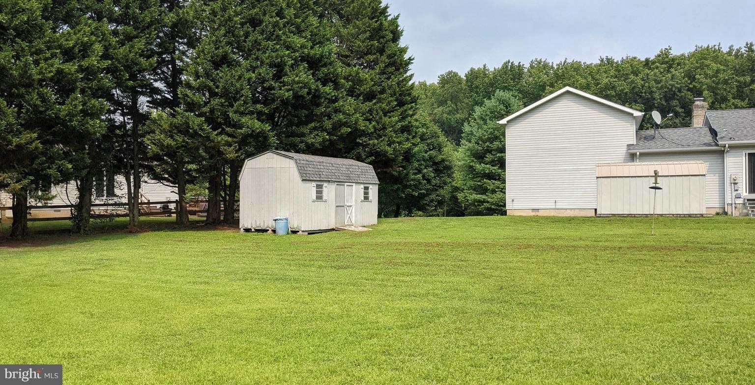 130 Taylor Road Centreville, MD 21617 - Photo 38 of 39 REAR YARD- TWO STORAGE SHEDS