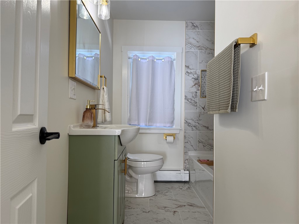 461 River Road Lincoln, RI 02865 - Photo 13 of 30 Full Bathroom with tiled flooring, tub surround