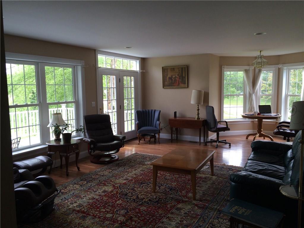 1 Cumberland Common Cumberland, ME 04021 - Photo 6 of 22 Living room with deck and breakfast...