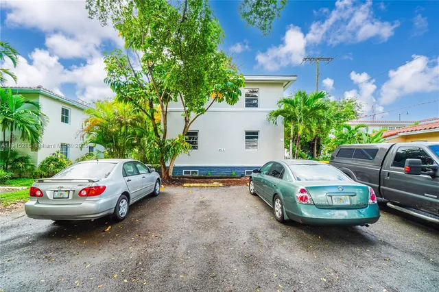 a car parked in front of a house