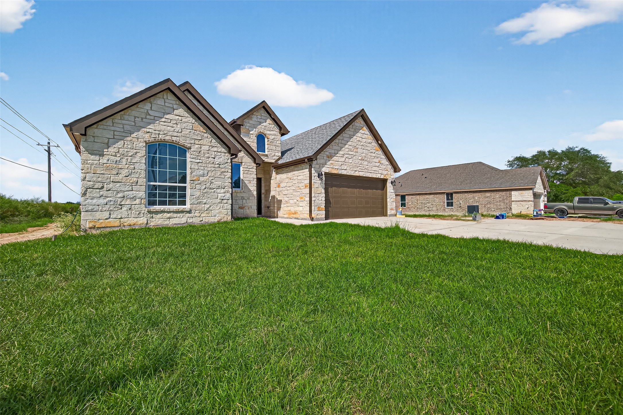 501 Oleander Street Prairie View, TX 77484 - Photo 2 of 48 a front view of house with yard and green space