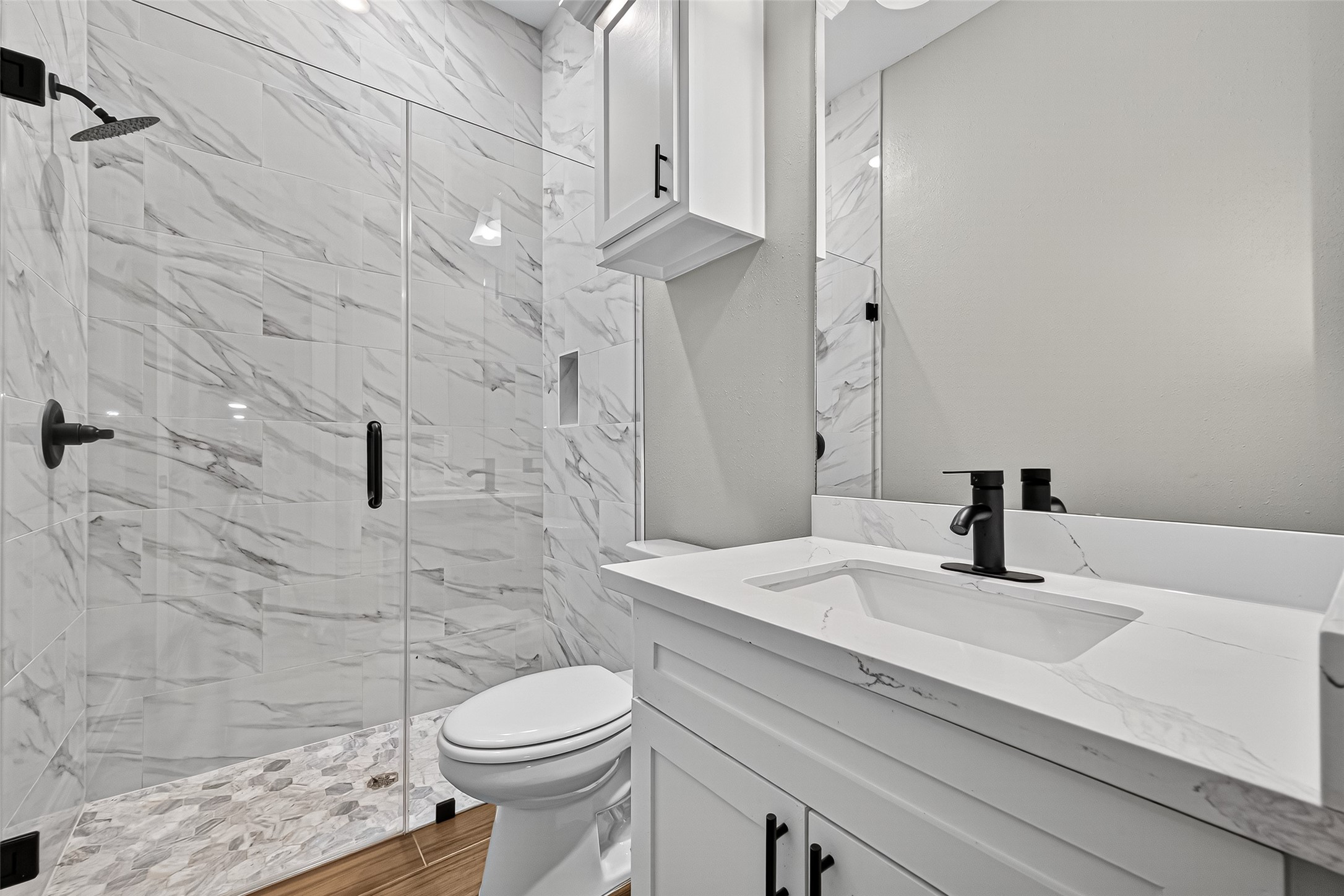 501 Oleander Street Prairie View, TX 77484 - Photo 42 of 48 a bathroom with a sink a toilet and shower
