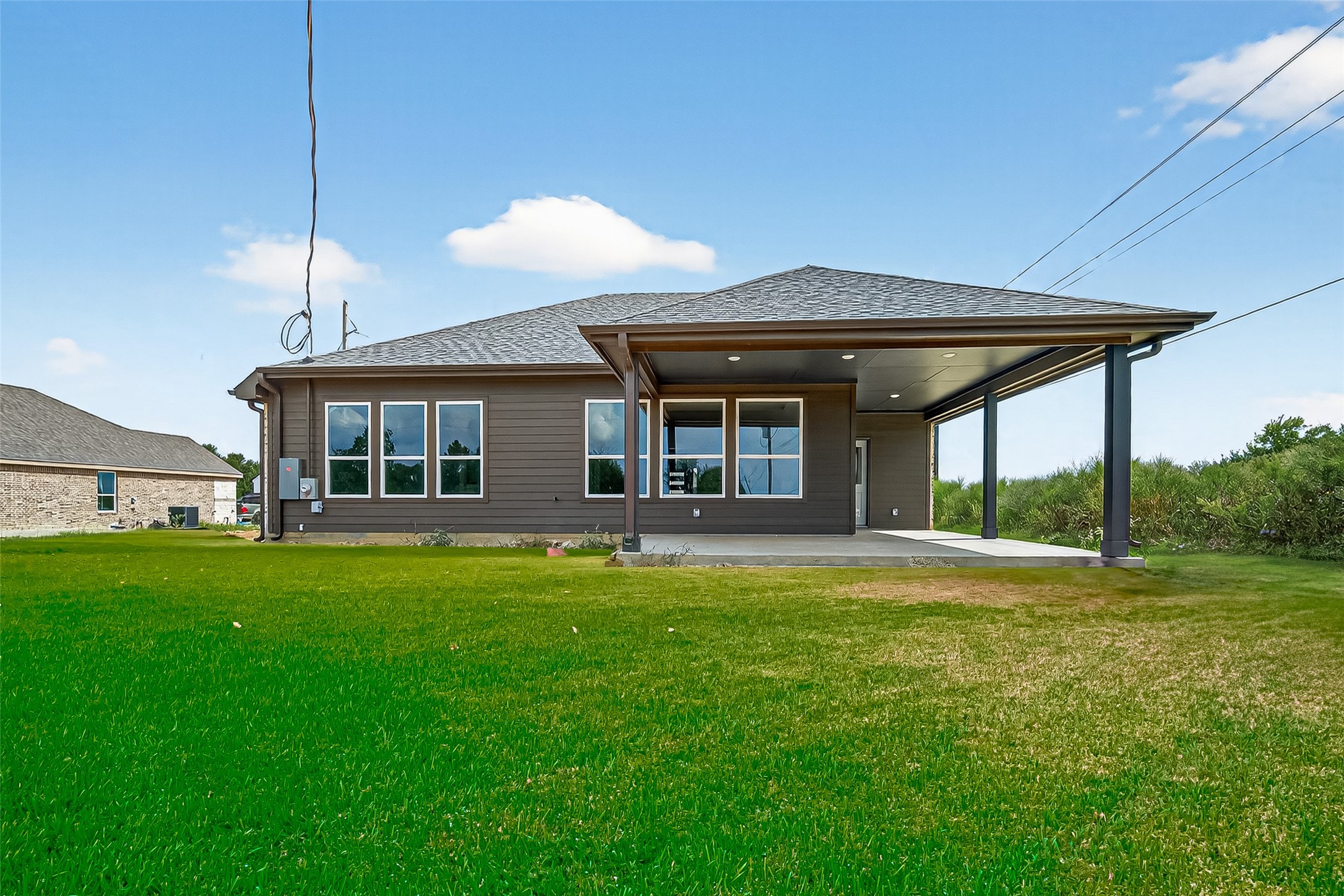 501 Oleander Street Prairie View, TX 77484 - Photo 46 of 48 a front view of a house with a garden