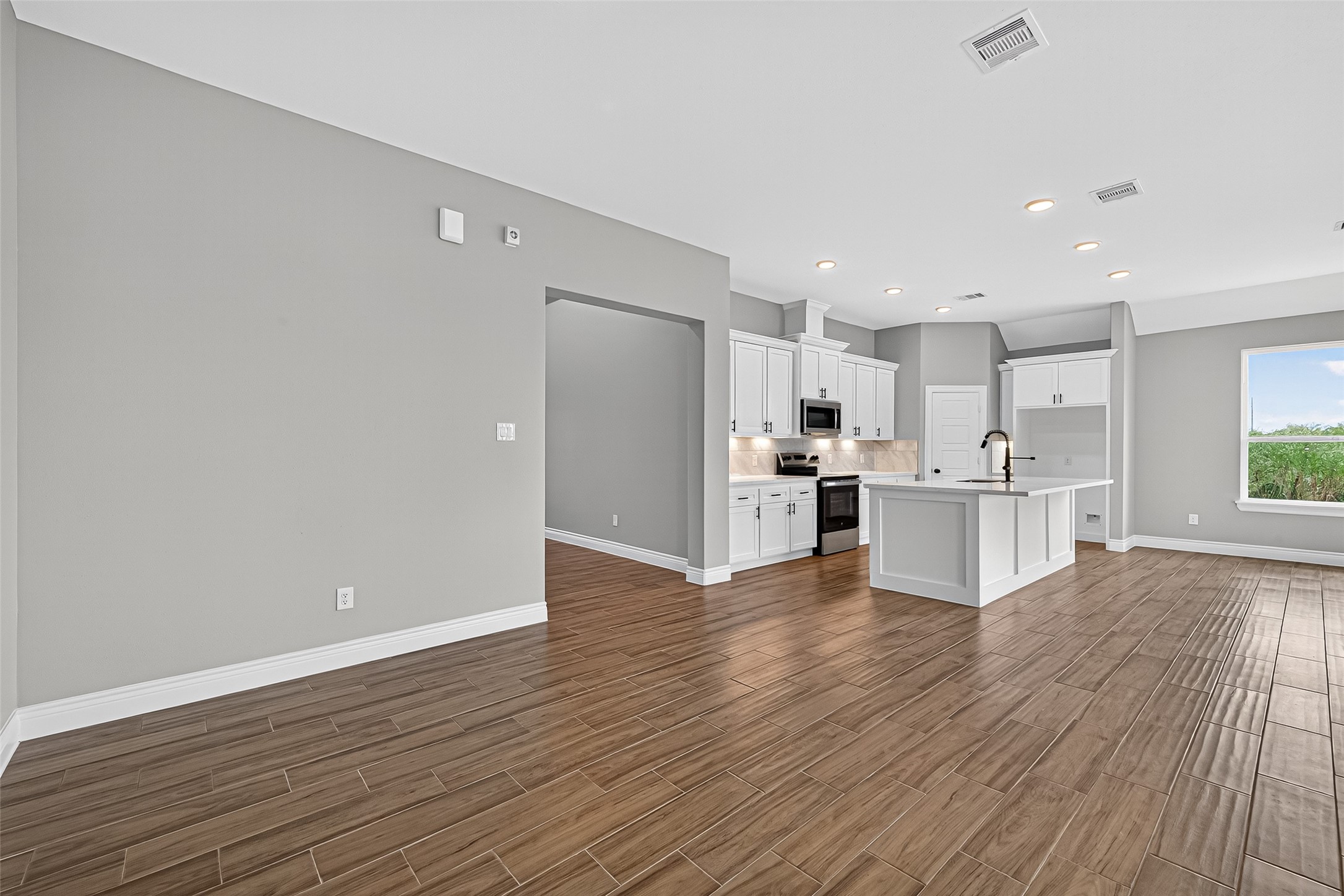 501 Oleander Street Prairie View, TX 77484 - Photo 10 of 48 a view of kitchen with wooden floor