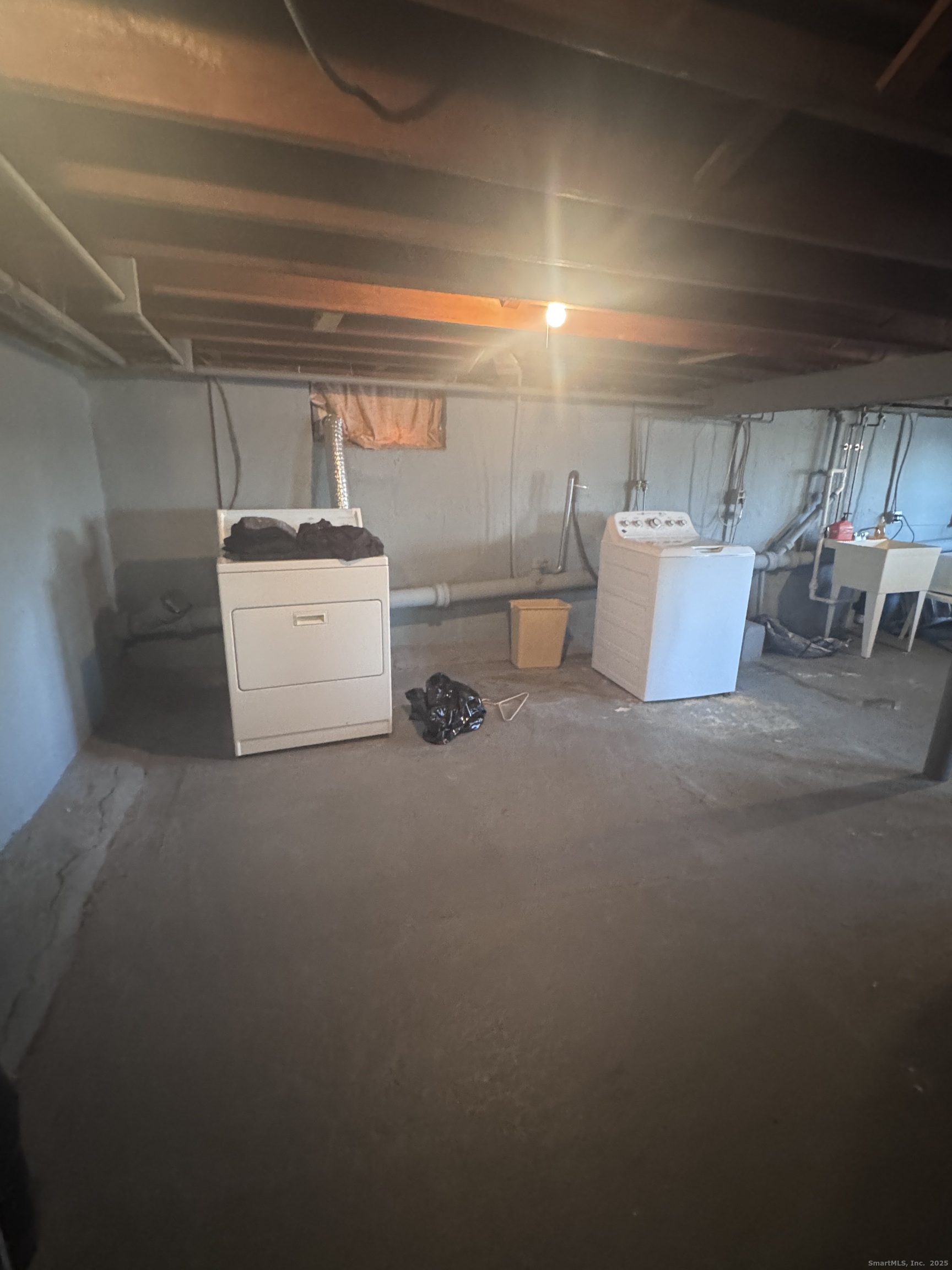 212 Dayton Road Bridgeport, CT 06606 - Photo 12 of 14 a utility room with dryer and washer