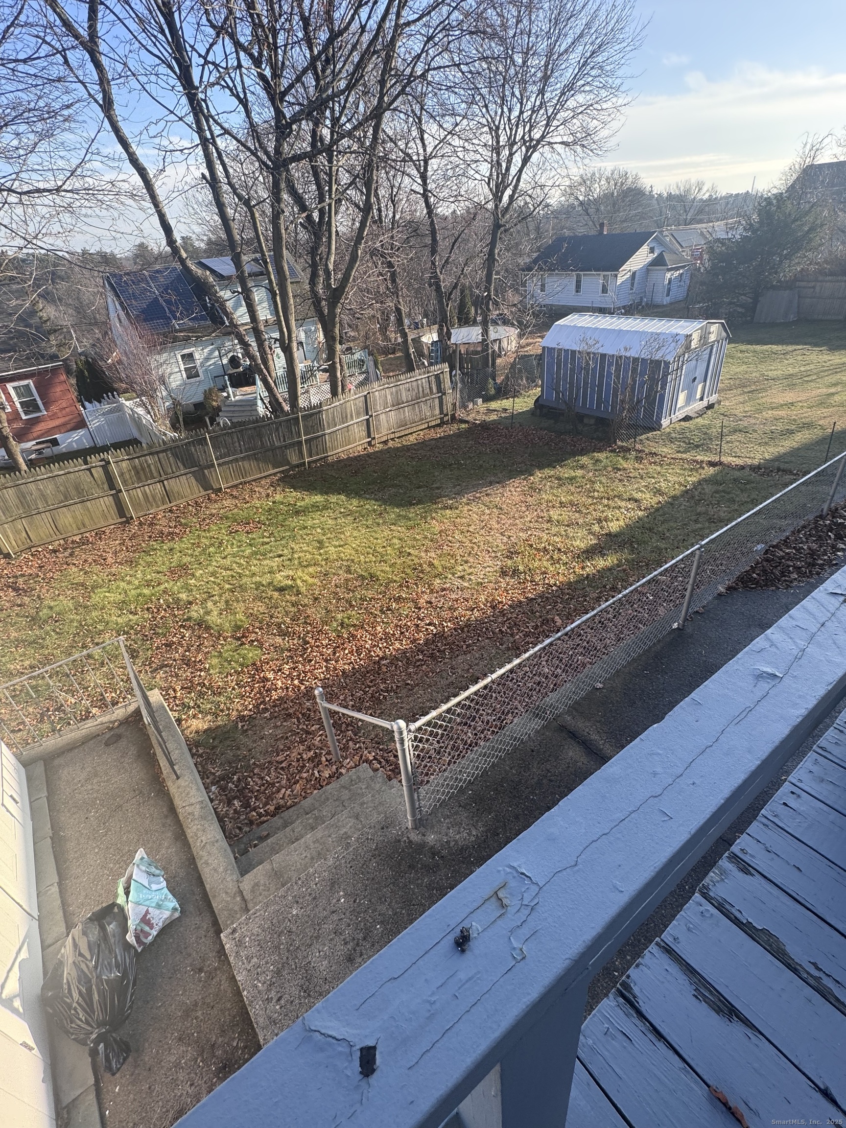 212 Dayton Road Bridgeport, CT 06606 - Photo 14 of 14 a view of a backyard with wooden floor