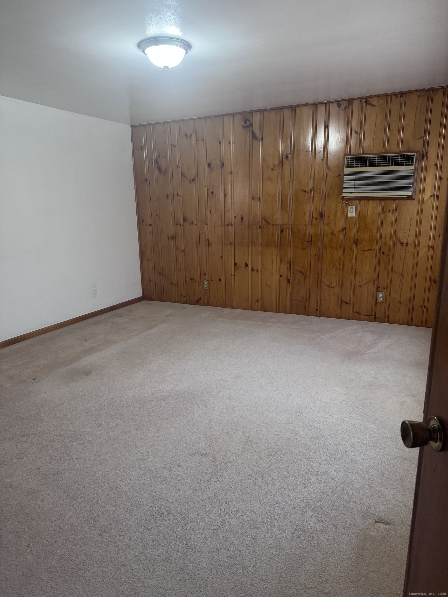 212 Dayton Road Bridgeport, CT 06606 - Photo 4 of 14 an empty room with closet area