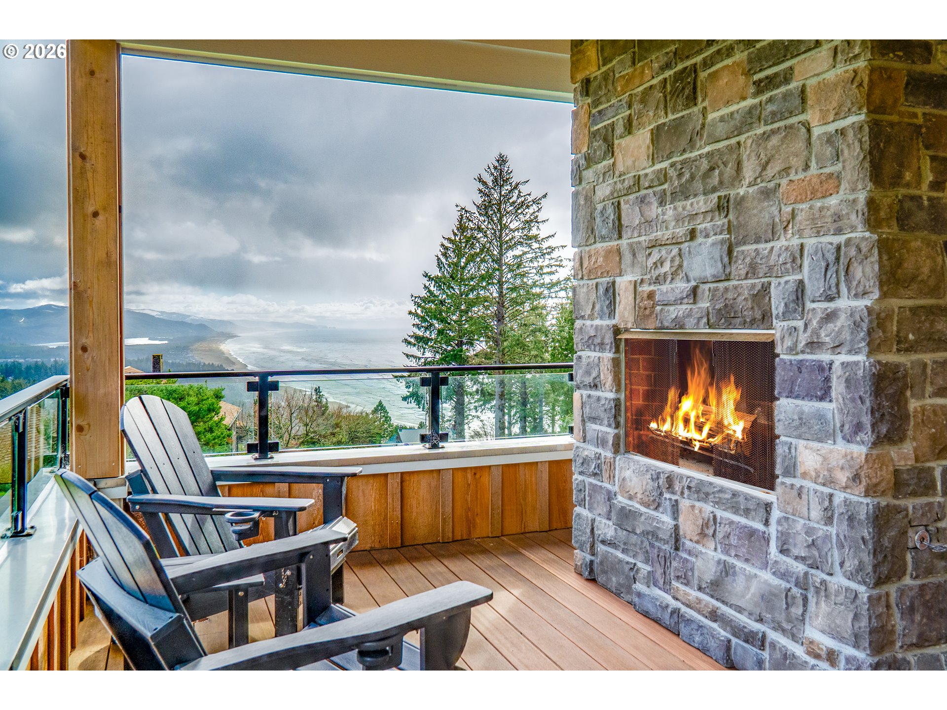 38590 Meadow Loop Nehalem, OR 97131 - Photo 23 of 48 a view of a balcony with two chairs and a table