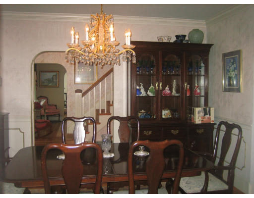 10 Sargent Road Winchester, MA 01890 - Photo 11 of 18 a view of a dining room with furniture