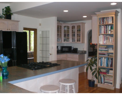 10 Sargent Road Winchester, MA 01890 - Photo 12 of 18 a kitchen with a refrigerator and a sink