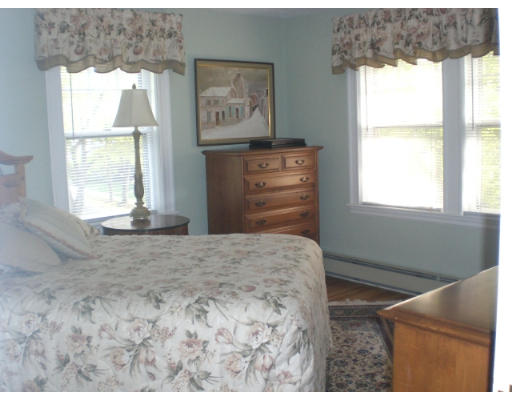 10 Sargent Road Winchester, MA 01890 - Photo 15 of 18 a bedroom with a bed and a window
