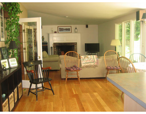10 Sargent Road Winchester, MA 01890 - Photo 8 of 18 a living room with furniture and a fireplace