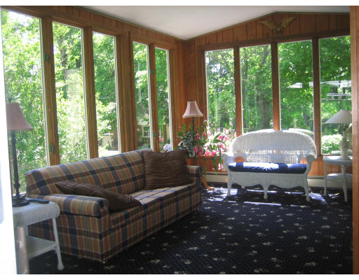 10 Sargent Road Winchester, MA 01890 - Photo 10 of 18 a living room with furniture and a large window