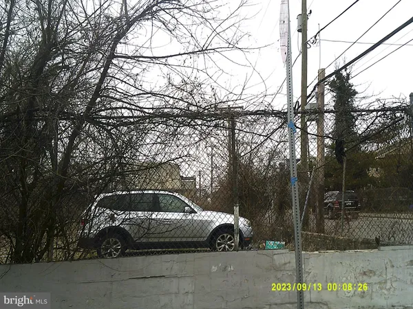 a car parked in front of a house