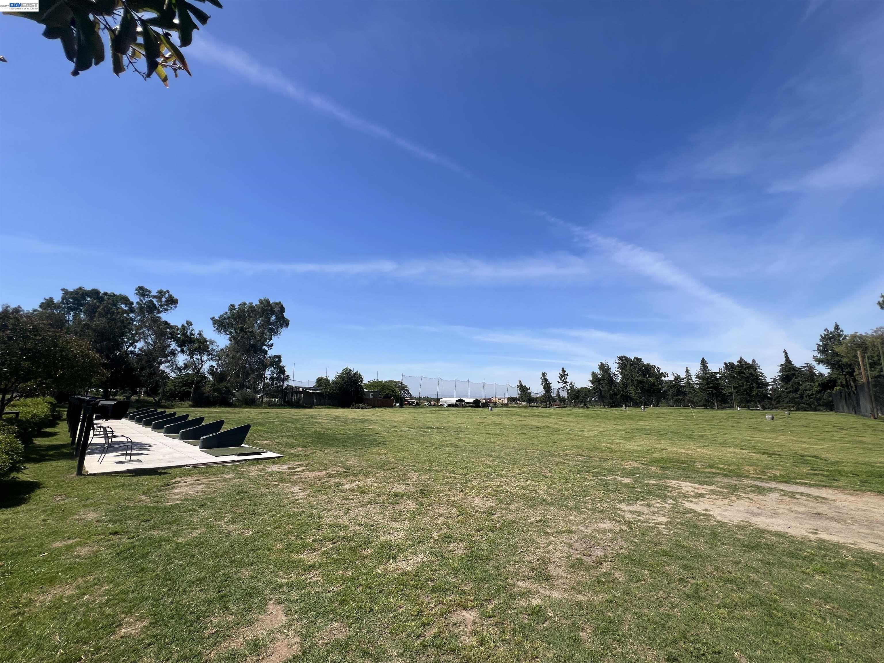 17051 Escalon-Bellota Road Escalon, CA 95320 - Photo 5 of 6 a view of a lake with a big yard