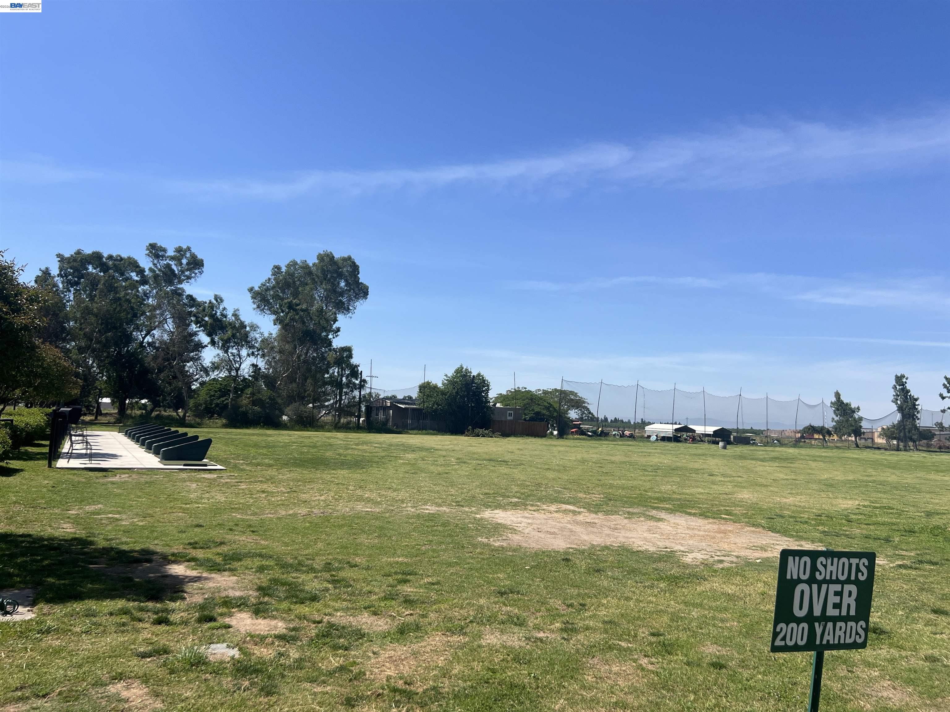 17051 Escalon-Bellota Road Escalon, CA 95320 - Photo 6 of 6 a view of a golf course with an ocean