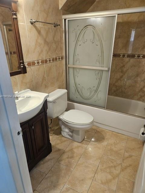 7211 West 24th Avenue, Unit 2304 Hialeah, FL 33016 - Photo 20 of 35 a bathroom with a sink a toilet and a mirror