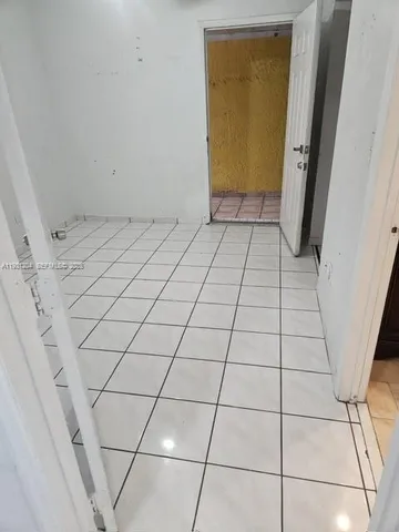 a view of a room with rack on the wall