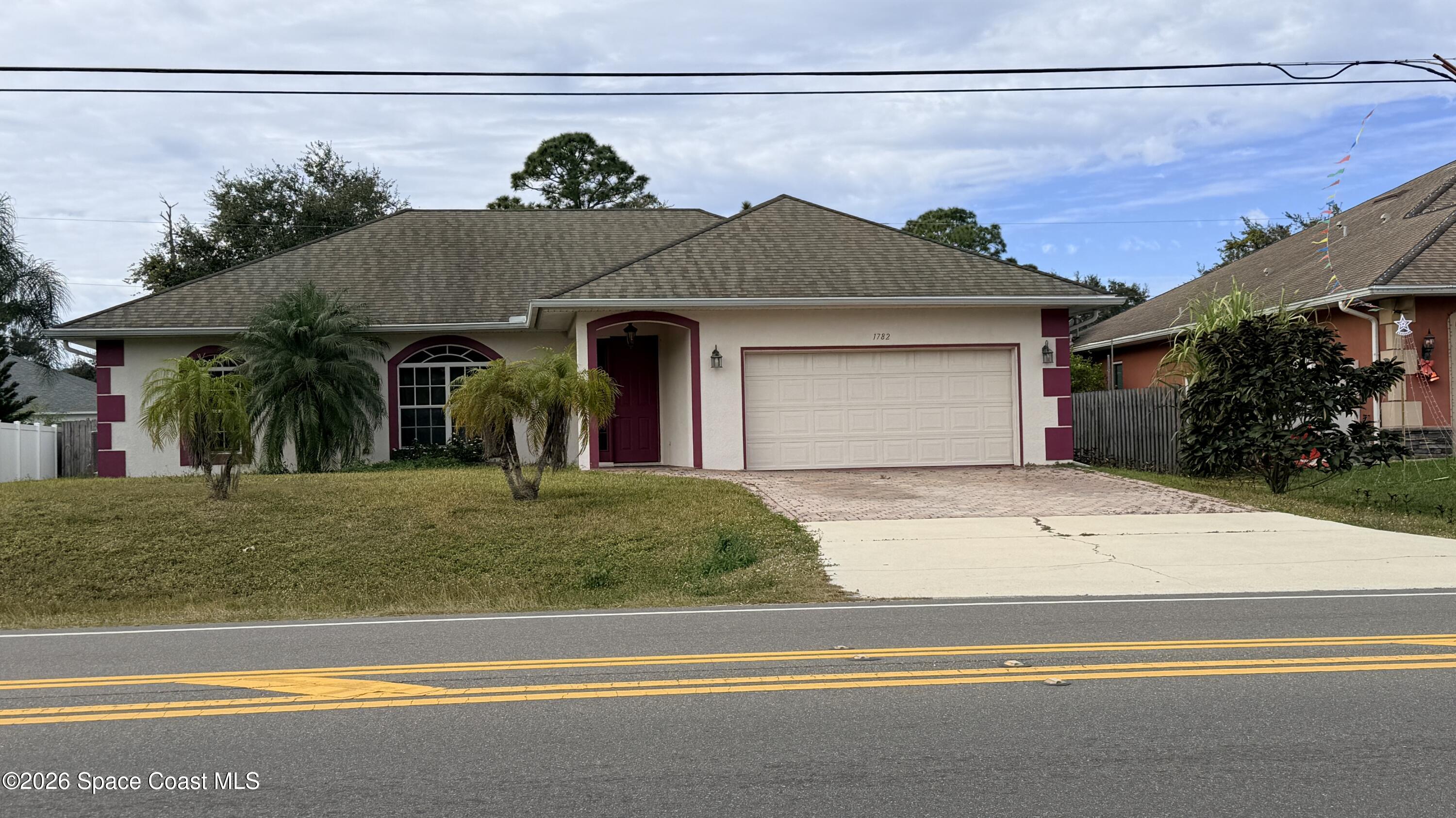 1782 Degroodt Road Southwest Palm Bay, FL 32908 - Photo 3 of 32 20251230_171431614_iOS