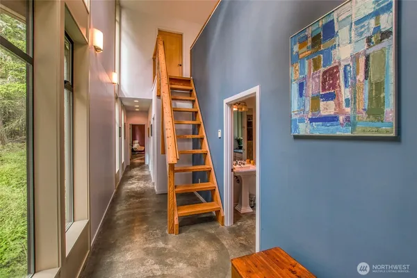 a view of livingroom with furniture and windows