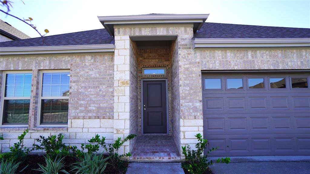 1374 Chisos Way Forney, TX 75126 - Photo 4 of 25 a front view of a house with plants