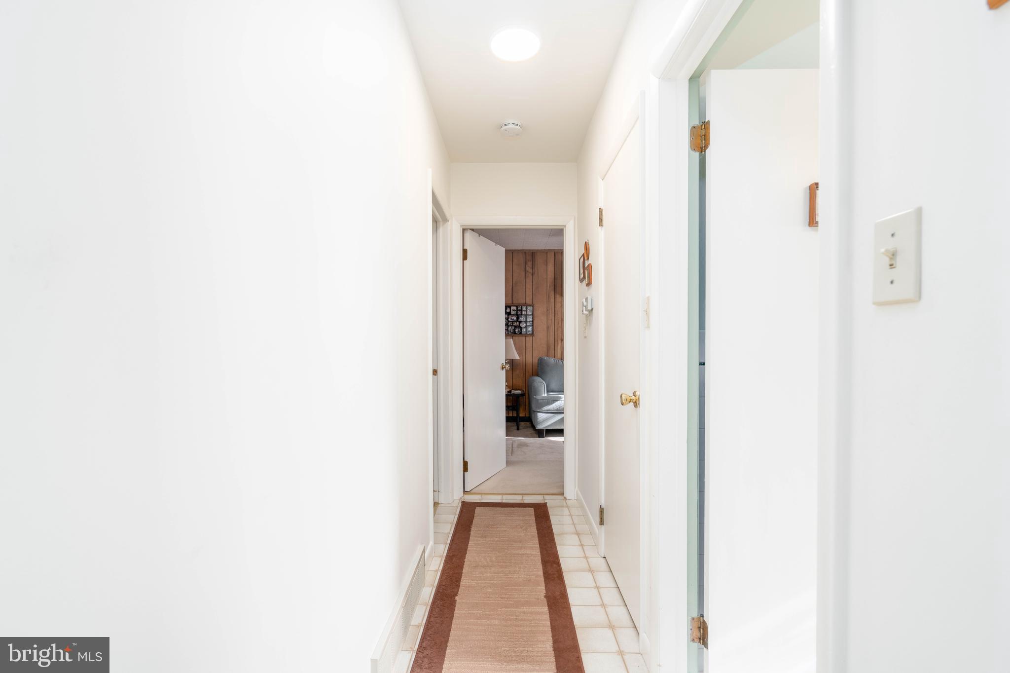 701 Uranus Road Millville, NJ 08332 - Photo 12 of 29 a view of a hallway with wooden floor and entryway