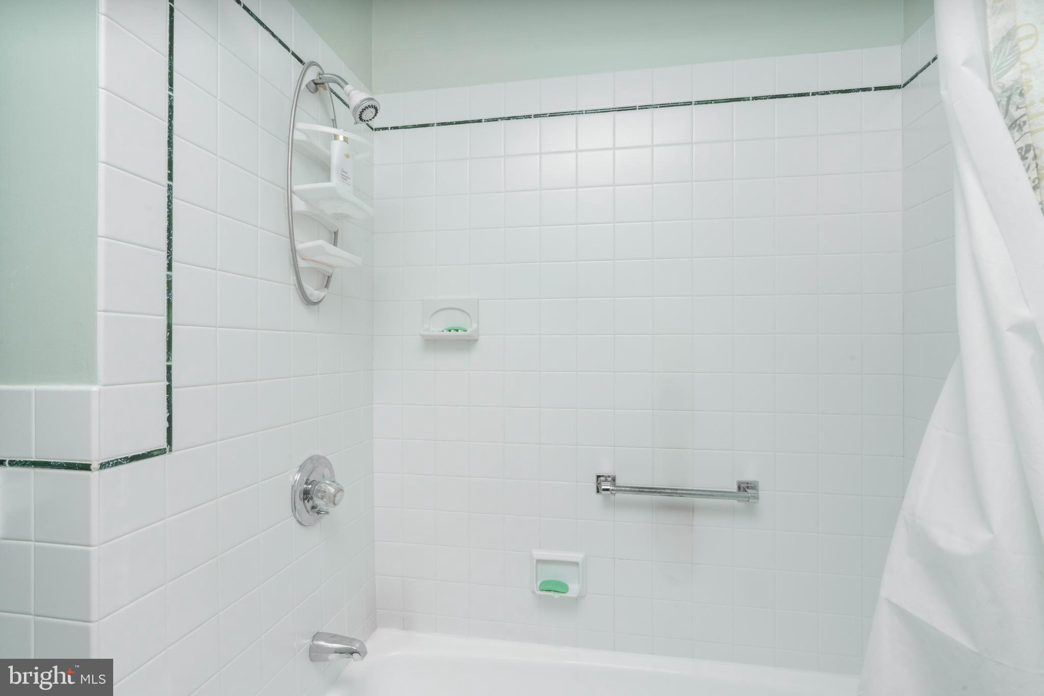 701 Uranus Road Millville, NJ 08332 - Photo 14 of 29 a bathroom with a shower and a shower