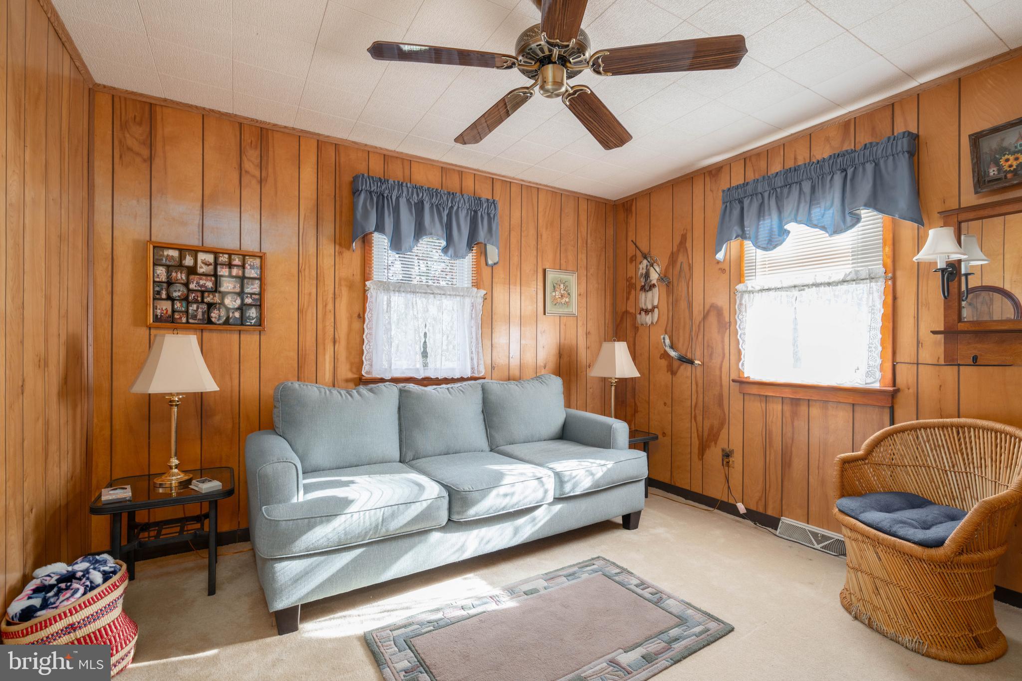 701 Uranus Road Millville, NJ 08332 - Photo 15 of 29 a living room with furniture and a window