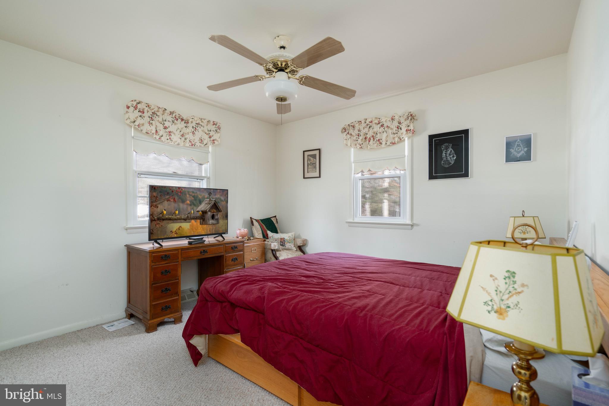701 Uranus Road Millville, NJ 08332 - Photo 17 of 29 a bedroom with a bed and furniture