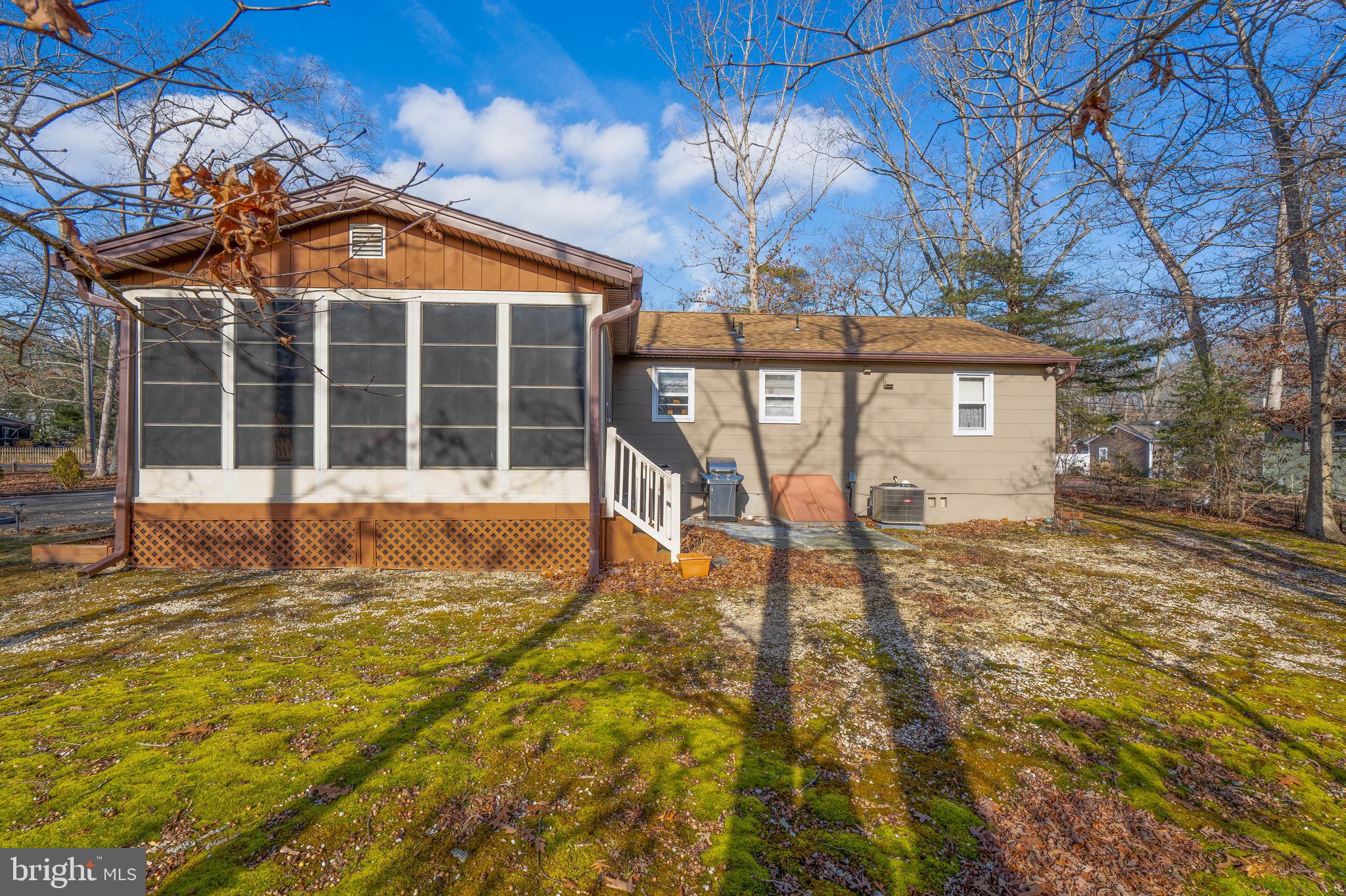 701 Uranus Road Millville, NJ 08332 - Photo 22 of 29 a view of a house with backyard and porch