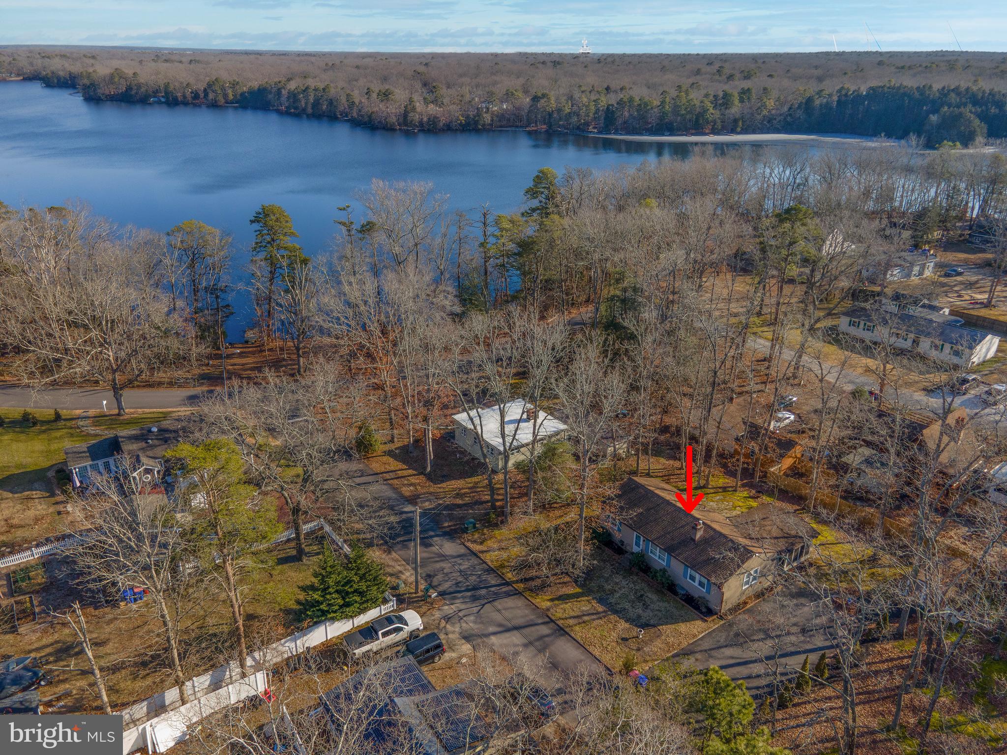 701 Uranus Road Millville, NJ 08332 - Photo 26 of 29 a view of a lake with a mountain and a yard