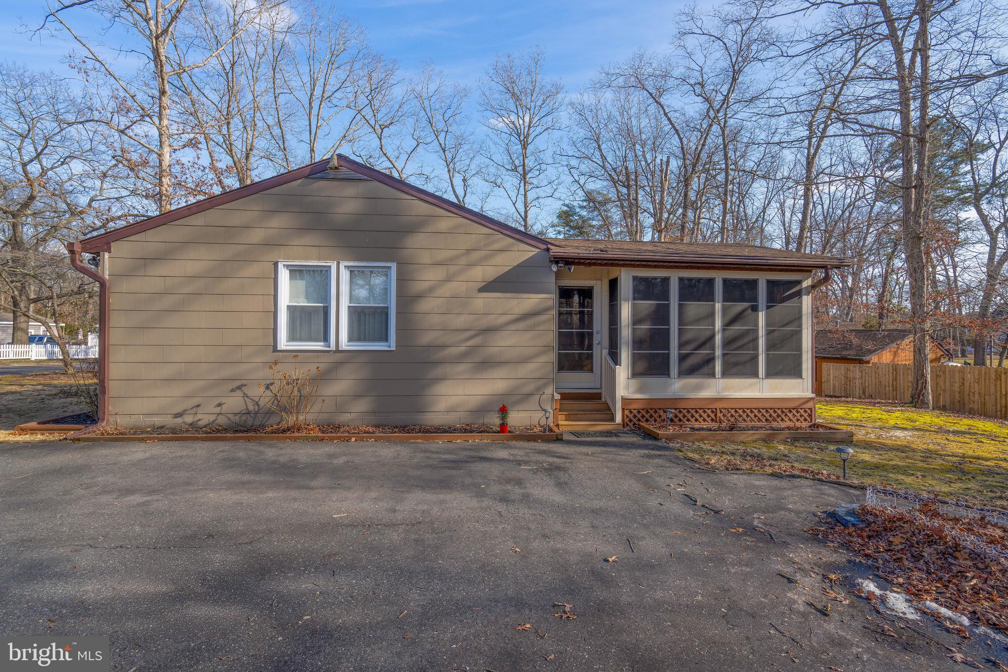 701 Uranus Road Millville, NJ 08332 - Photo 28 of 29 a front view of a house with a yard