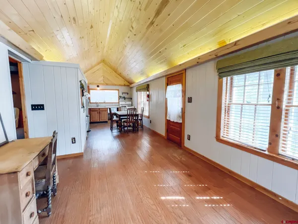 a view of livingroom with furniture and a window