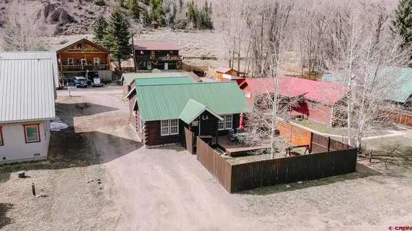 an aerial view of a house with a flat screen tv