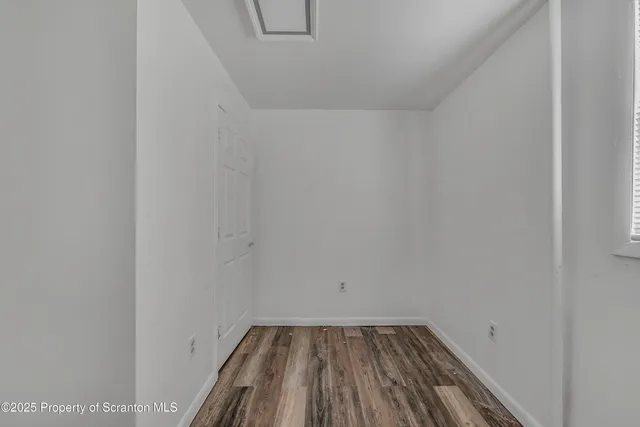 a view of small space with racks on the wall